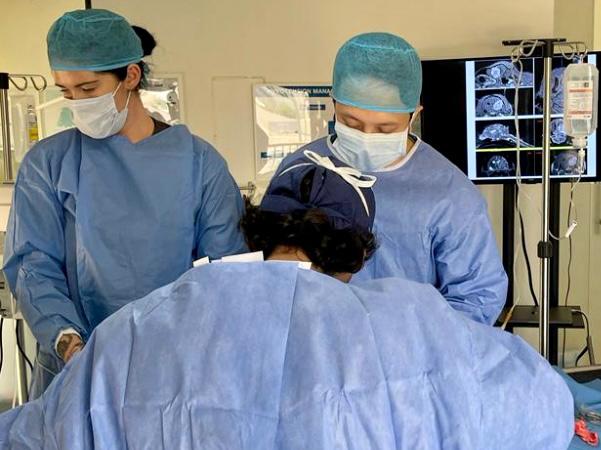 Veterinarians at Khalifa City pet clinic performing a surgical procedure on a canine patient